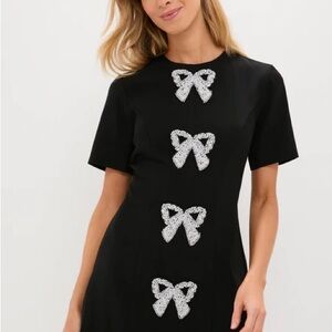 Chic Black Mini Dress with Silver Bow Details